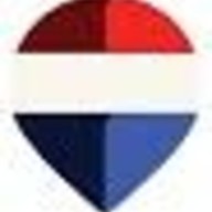The Vaulet Group Real Estate logo