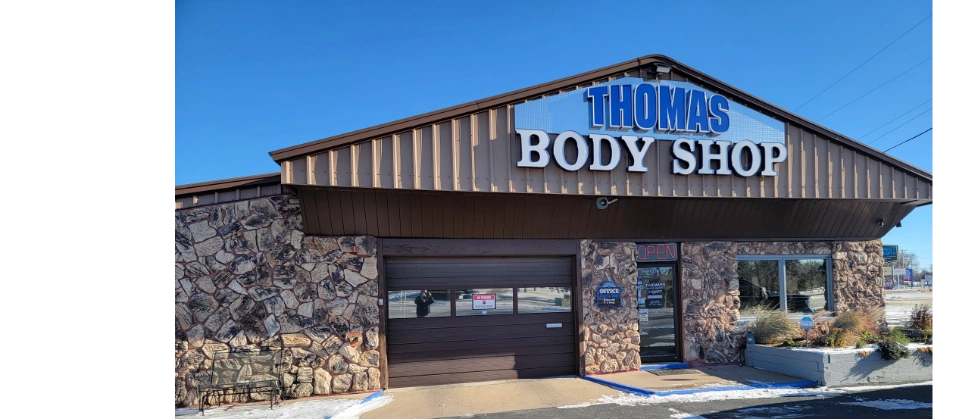 Thomas Auto Body & Collision logo